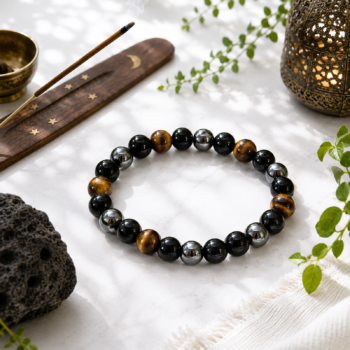 Hematite, Black Obsidian and Tiger Eye Triple Protection Bracelet displayed with incense and natural decor