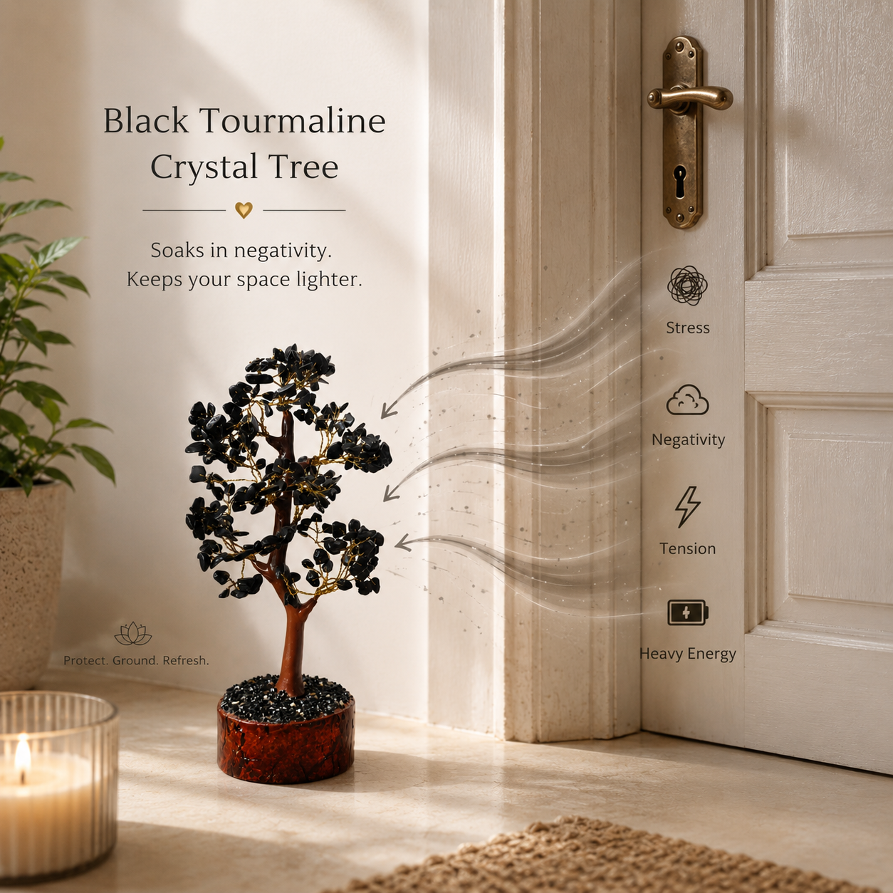Black Tourmaline crystal tree near an entrance, traditionally used for grounding and protection from unwanted energy