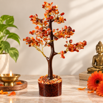 Carnelian crystal tree with orange gemstone chips in a warm home decor setting