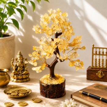 Citrine Crystal Tree displayed with coins, Ganesha, and prosperity-inspired décor