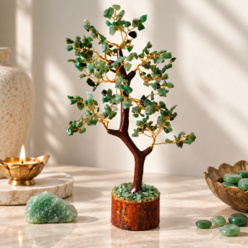 Green Aventurine crystal tree with natural gemstone chips and golden wire branches in a warm neutral setting