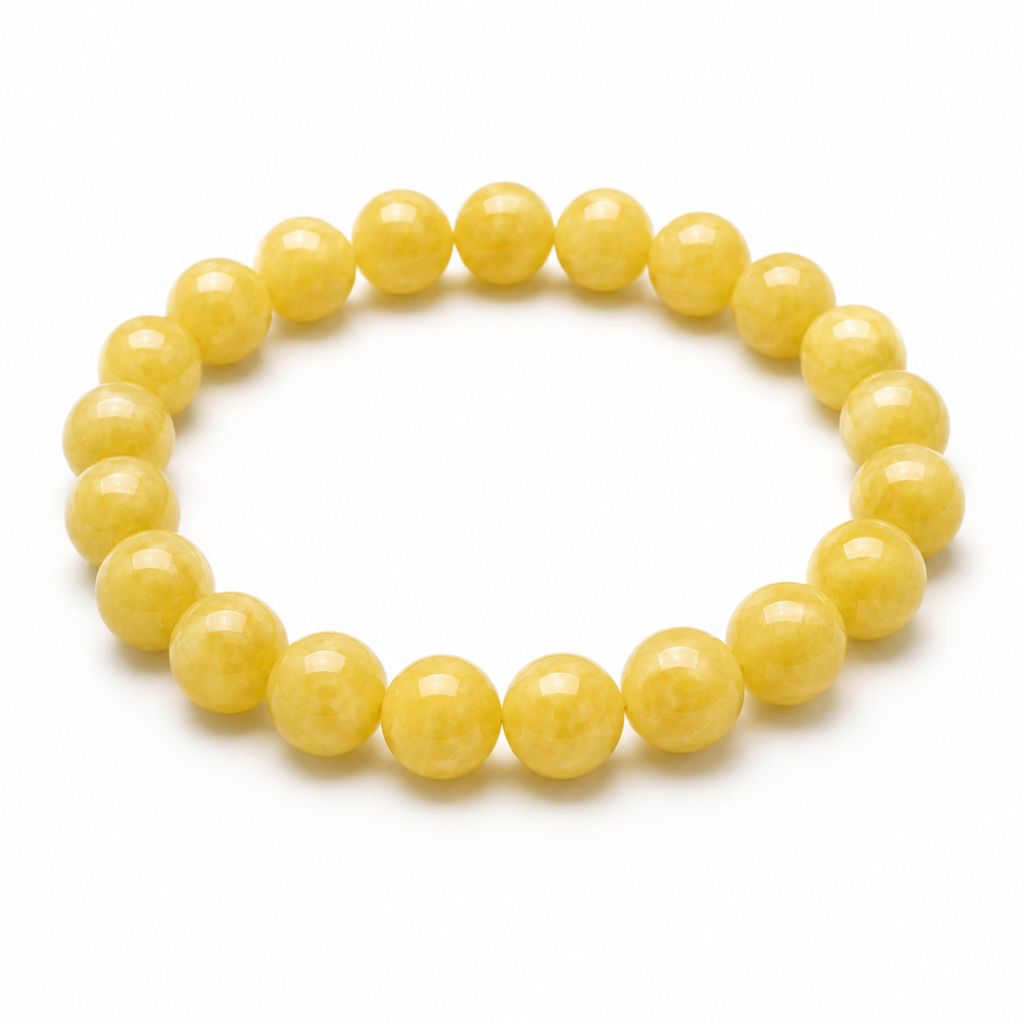 Yellow Jade gemstone bracelet with polished round beads displayed on a white background, showcasing its smooth honey-yellow color and glossy finish.