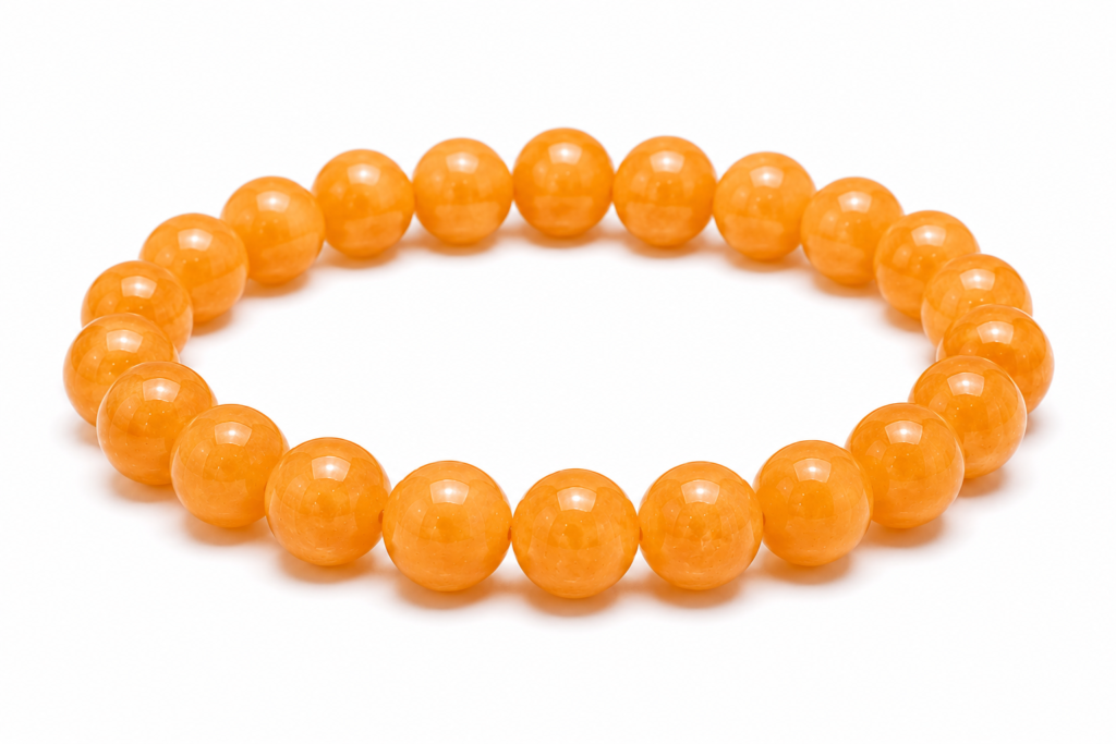 Orange Calcite crystal bracelet associated with the Sacral Chakra