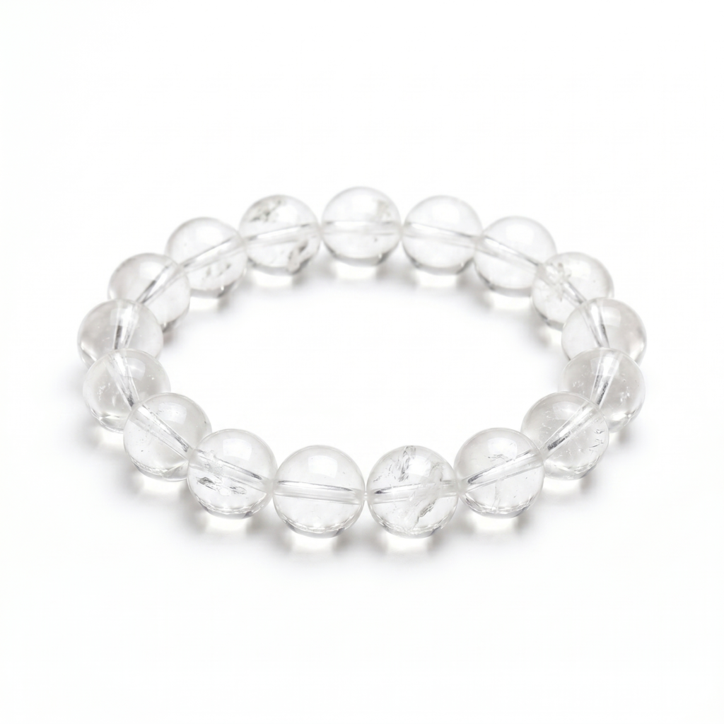 Natural Clear Quartz bracelet isolated on a white background, traditionally associated with clarity, focus, positive intention, and the Third Eye Chakra.