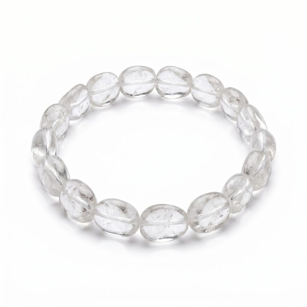 Natural Clear Quartz crystal bracelet with polished round gemstone beads on a white background, suitable for meditation, mindfulness, and everyday wear for Crown Chakra(Sahasrar)