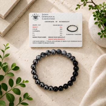 Makar Rashi Capricorn bracelet with Snowflake Obsidian, Black Onyx and Hematite beads displayed with authenticity certificate
