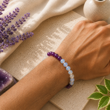 Meen Rashi Pisces bracelet with Purple Suleimani, Opalite and Selenite beads worn on the wrist