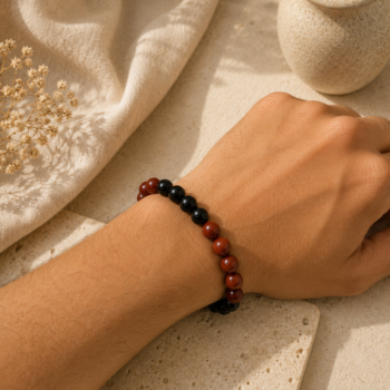 Vrushchik Rashi Bracelet with Red Jasper and Black Onyx beads worn on a wrist