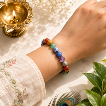 7 Chakra crystal bracelet worn on wrist with colorful gemstone beads